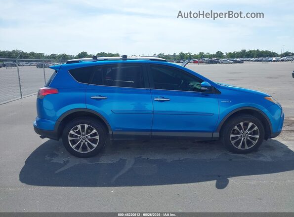 JTMDJREV9GD032553 2016 TOYOTA RAV4 HYBRID Blue Вид задньої частини салону