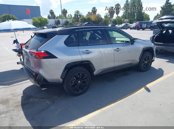 JTME6RFV0SJ066038 2025 TOYOTA RAV4 HYBRID Gray Trasero derecho