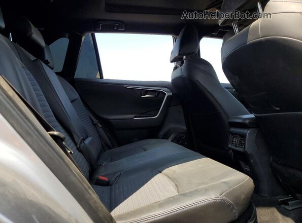 JTME6RFV8RJ061504 2024 TOYOTA RAV4 Silver Rear interior view