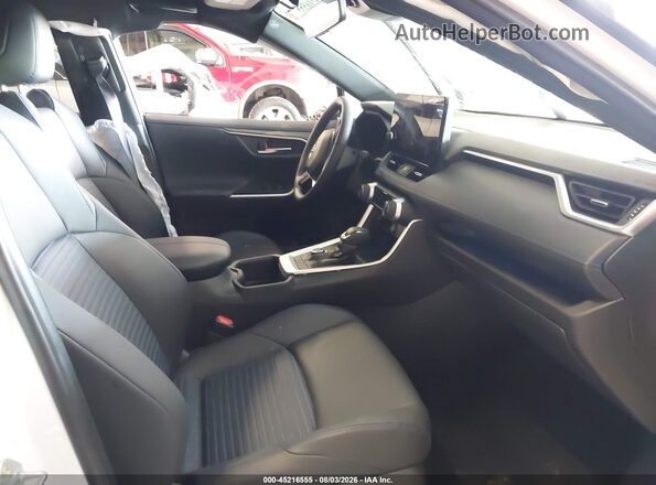 JTME6RFV9SJ094548 2025 TOYOTA RAV4 HYBRID White Front interior view