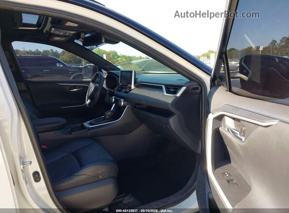 JTMEWRFV4KJ023693 2019 TOYOTA RAV4 HYBRID White Front interior view