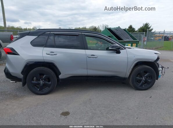 JTMEWRFV7KD505816 2019 TOYOTA RAV4 HYBRID Silver Вид задньої частини салону