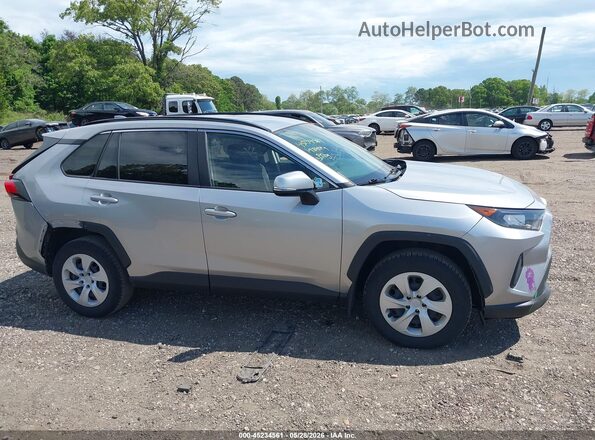 JTMG1RFV2KJ021724 2019 TOYOTA RAV4 Silver უკანა სალონის ხედი