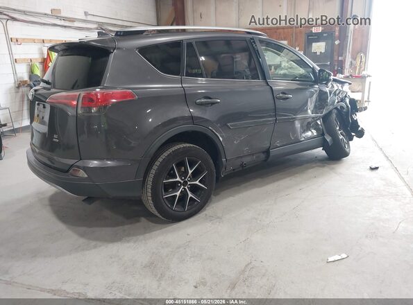 JTMJFREV7HJ714497 2017 TOYOTA RAV4 Gray Trasero derecho