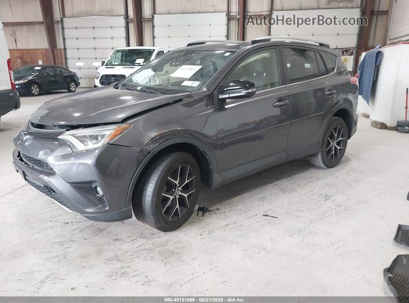 JTMJFREV7HJ714497 2017 TOYOTA RAV4 Gray Vista tres cuartos delantera izquierda
