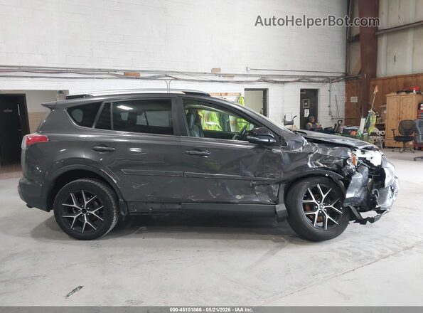 JTMJFREV7HJ714497 2017 TOYOTA RAV4 Gray Vista interior trasera