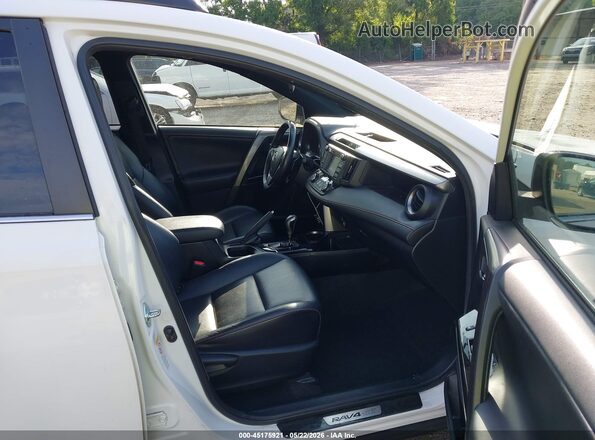 JTMJFREVXGD193112 2016 TOYOTA RAV4 White წინა სალონის ხედი