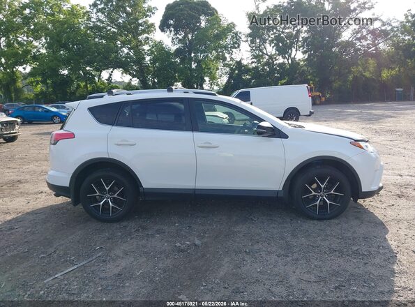 JTMJFREVXGD193112 2016 TOYOTA RAV4 White უკანა სალონის ხედი