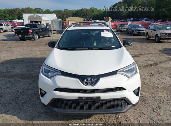 JTMJFREVXGD193112 2016 TOYOTA RAV4 White ხელსაწყოთა პანელის ხედი