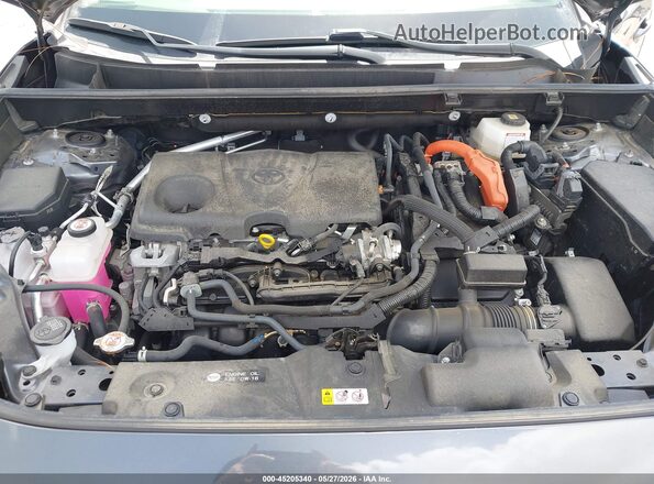 JTMLWRFV8ND155317 2022 TOYOTA RAV4 HYBRID Gray Rear view