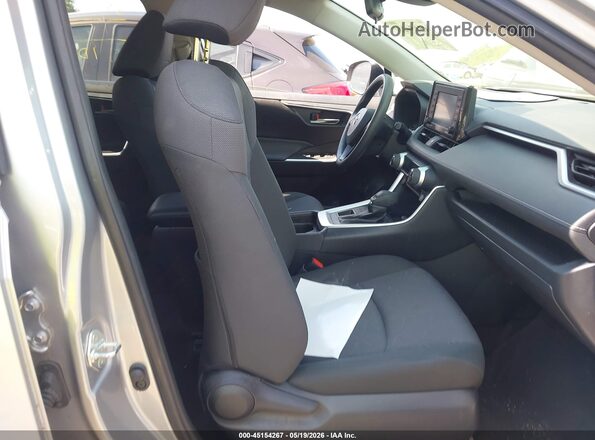 JTMP1RFV3LJ028523 2020 TOYOTA RAV4 Silver Front interior view