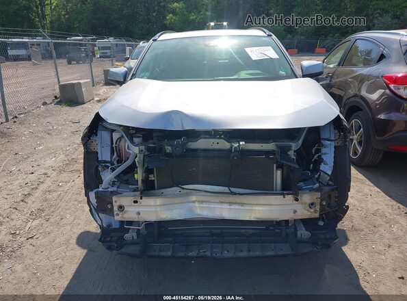 JTMP1RFV3LJ028523 2020 TOYOTA RAV4 Silver Rear interior view