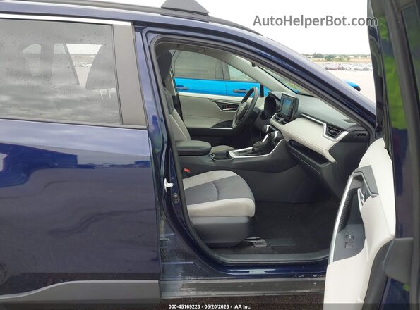 JTMP1RFV5KJ017683 2019 TOYOTA RAV4 Blue Vista interior delantera