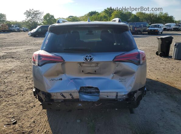 JTMRFREV1JJ188134 2018 TOYOTA RAV4 Silver Rear view