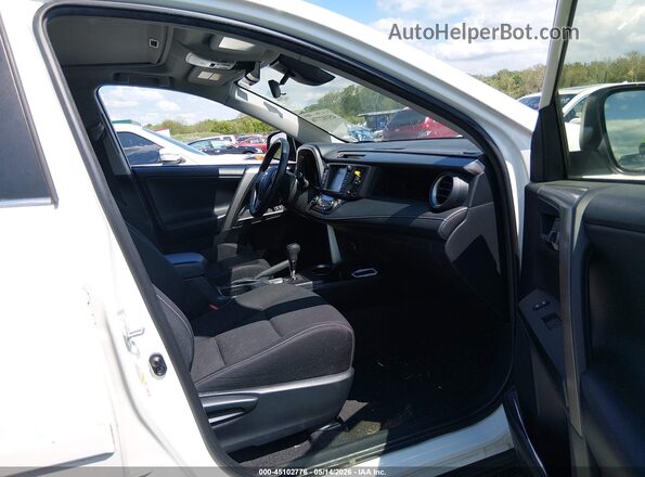 JTMRFREV2JJ178034 2018 TOYOTA LE White Вид салону спереду