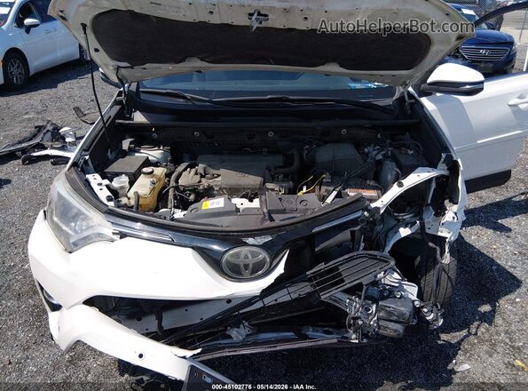 JTMRFREV2JJ178034 2018 TOYOTA LE White Вид ззаду