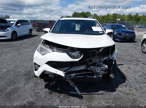 JTMRFREV2JJ178034 2018 TOYOTA LE White Вид задньої частини салону