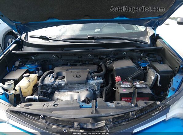 JTMRFREV4GJ084570 2016 TOYOTA LE Blue Rear view