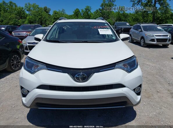 JTMRFREV5JD228763 2018 TOYOTA RAV4 White Rear interior view