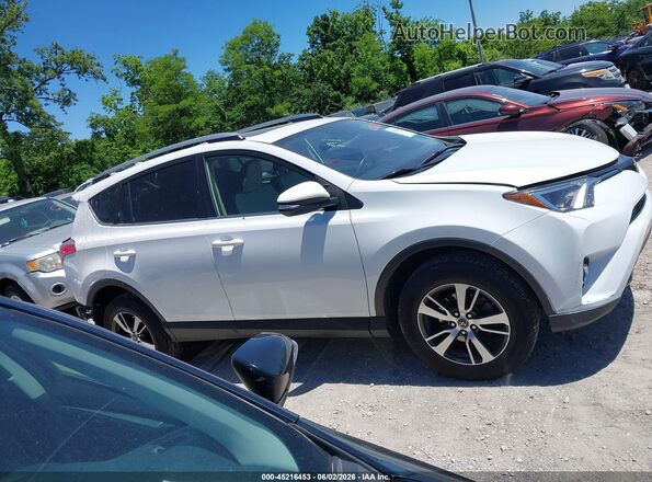 JTMRFREV5JD228763 2018 TOYOTA RAV4 White 360 interior view