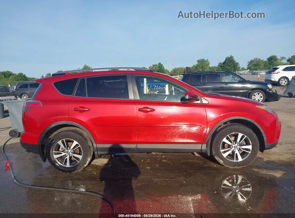 JTMRFREV7HJ157075 2017 TOYOTA RAV4 Red Vista interior trasera