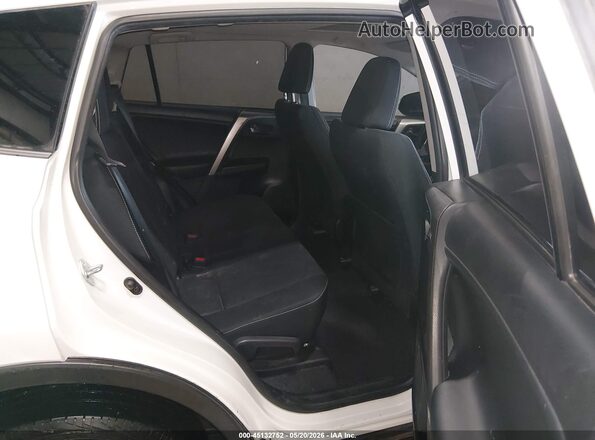 JTMRFREV7JJ189806 2018 TOYOTA RAV4 White Vista de la etiqueta del VIN
