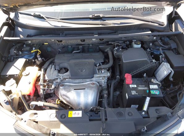 JTMRFREV8HJ133108 2017 TOYOTA LE Black Rear view