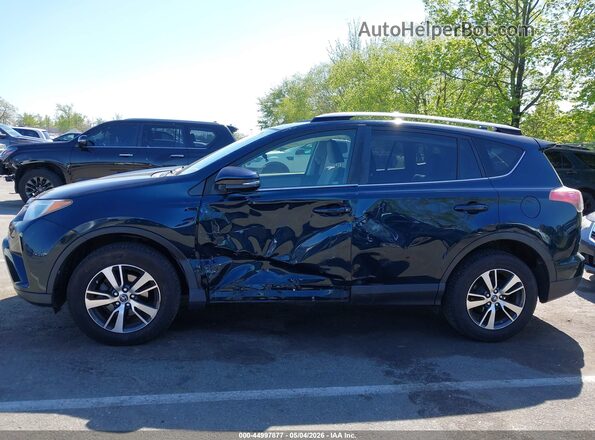 JTMRFREV8HJ133108 2017 TOYOTA LE Black Front view