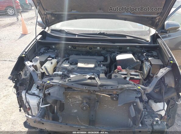 JTMRFREV8JJ231741 2018 TOYOTA RAV4 Gray Rear view