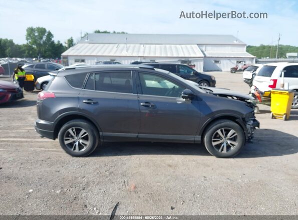 JTMRFREV8JJ231741 2018 TOYOTA RAV4 Gray Rear interior view