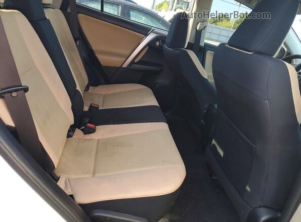 JTMRFREV9GJ068820 2016 TOYOTA RAV4 White Rear interior view