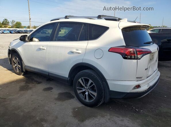 JTMRFREV9GJ068820 2016 TOYOTA RAV4 White Rear left