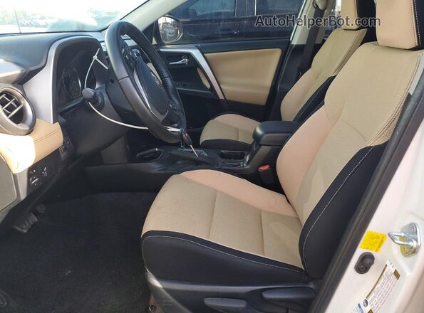 JTMRFREV9GJ068820 2016 TOYOTA RAV4 White Front interior view