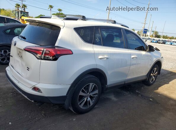 JTMRFREV9GJ068820 2016 TOYOTA RAV4 White Rear right