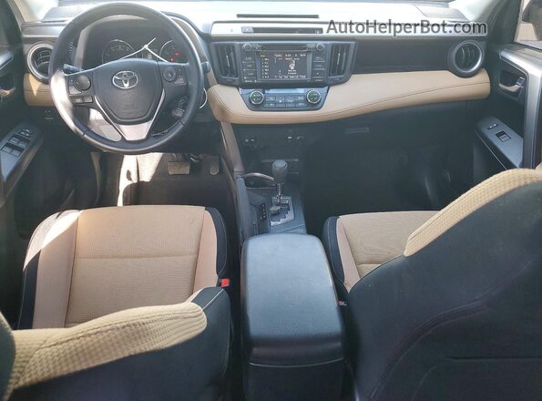 JTMRFREV9GJ068820 2016 TOYOTA RAV4 White Dashboard view