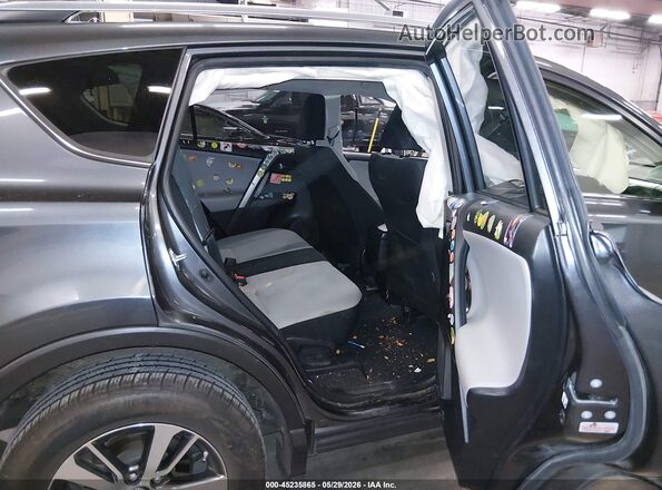 JTMRFREV9JD255092 2018 TOYOTA RAV4 Gray VIN კოდის სტიკერის ხედი
