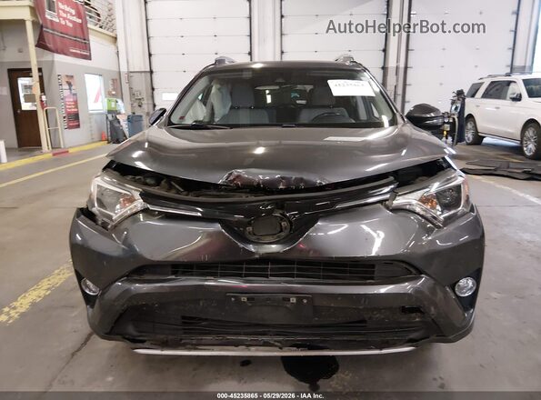 JTMRFREV9JD255092 2018 TOYOTA RAV4 Gray ხელსაწყოთა პანელის ხედი