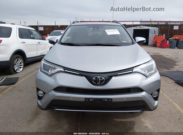 JTMRFREV9JJ196370 2018 TOYOTA LE Silver Vista interior trasera