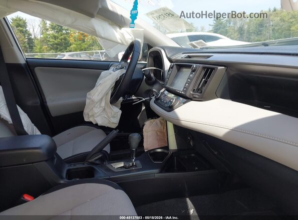 JTMRFREVXGJ102540 2016 TOYOTA RAV4 White Front interior view