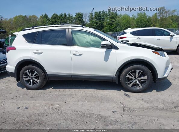 JTMRFREVXGJ102540 2016 TOYOTA RAV4 White Rear interior view
