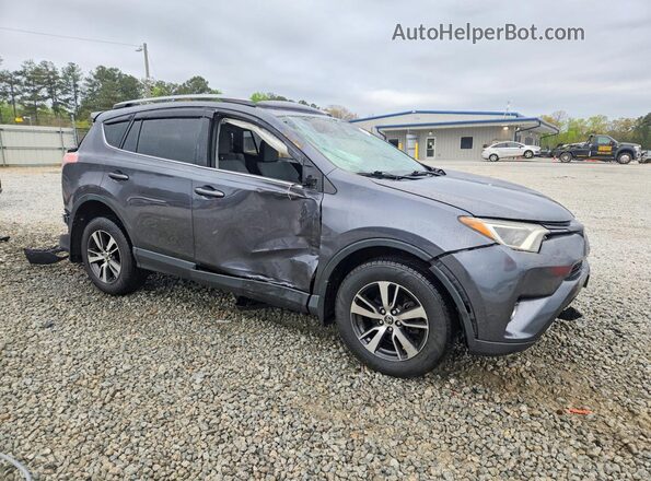 JTMRFREVXHD221673 2017 TOYOTA RAV4 Gray Front right