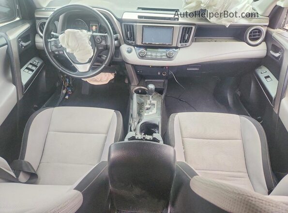 JTMRFREVXHD221673 2017 TOYOTA RAV4 Gray Dashboard view