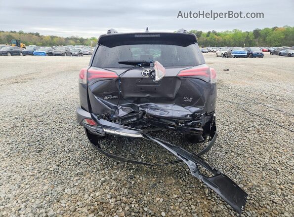 JTMRFREVXHD221673 2017 TOYOTA RAV4 Gray Rear view