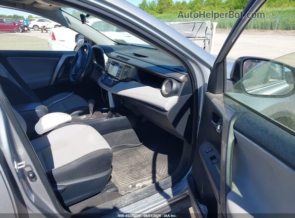 JTMRFREVXJJ223091 2018 TOYOTA RAV4 Silver Front interior view