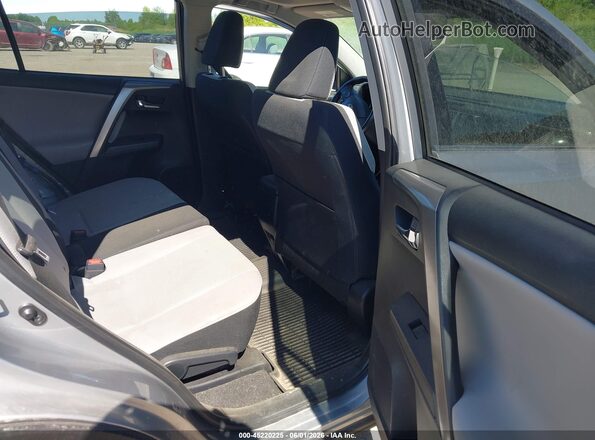 JTMRFREVXJJ223091 2018 TOYOTA RAV4 Silver VIN sticker view