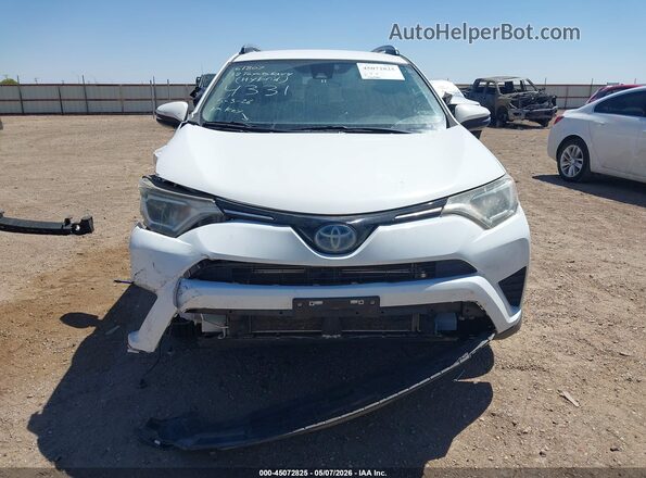 JTMRJREV3JD174331 2018 TOYOTA LE White Սալոնի հետևի տեսք