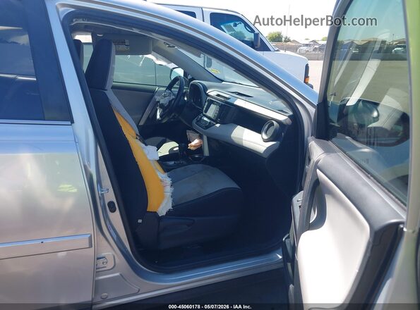 JTMRJREV7GD054699 2016 TOYOTA LE Silver 