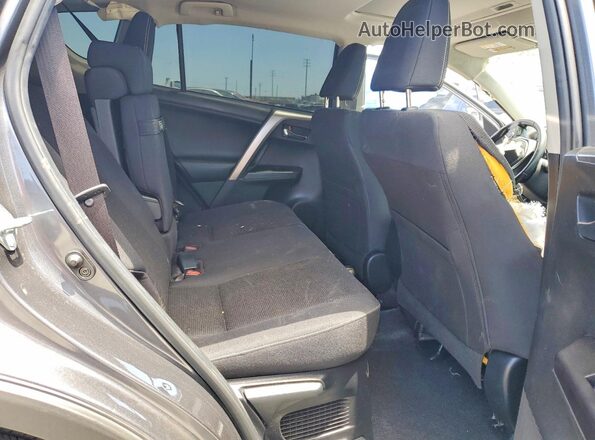 JTMRJREV7HD086263 2017 TOYOTA RAV4 Charcoal Rear interior view
