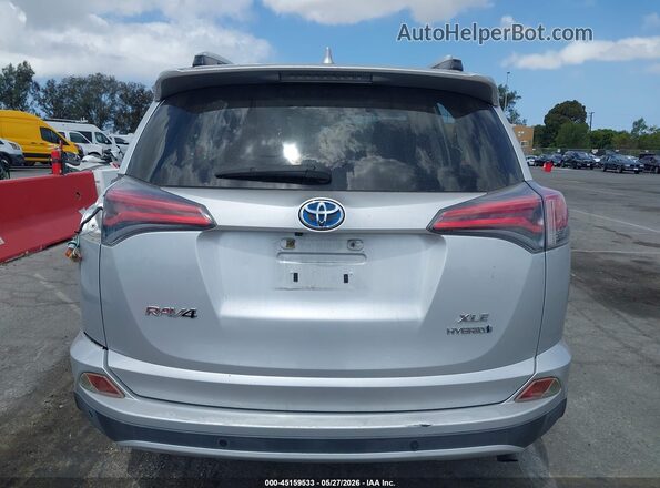 JTMRJREV9GD012079 2016 TOYOTA RAV4 HYBRID Silver 