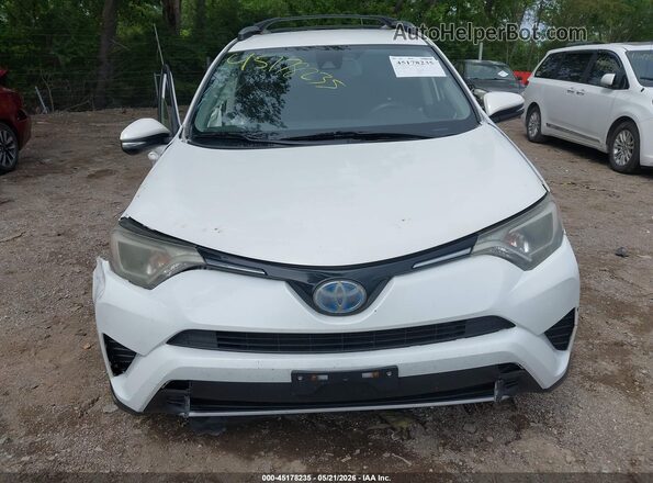 JTMRJREV9JD236749 2018 TOYOTA RAV4 HYBRID White Instrument cluster view